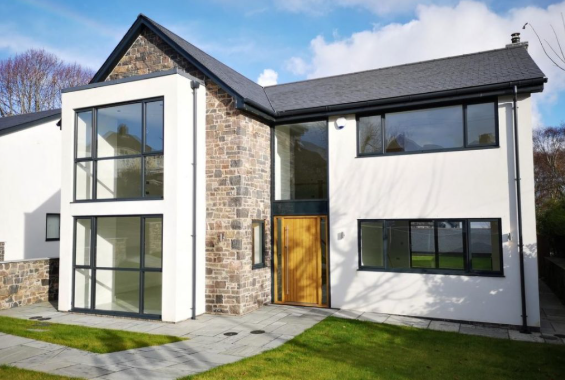 Large residential property with landscaped gardens